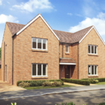 new build double fronted detached house built with roof trusses on a sunny day